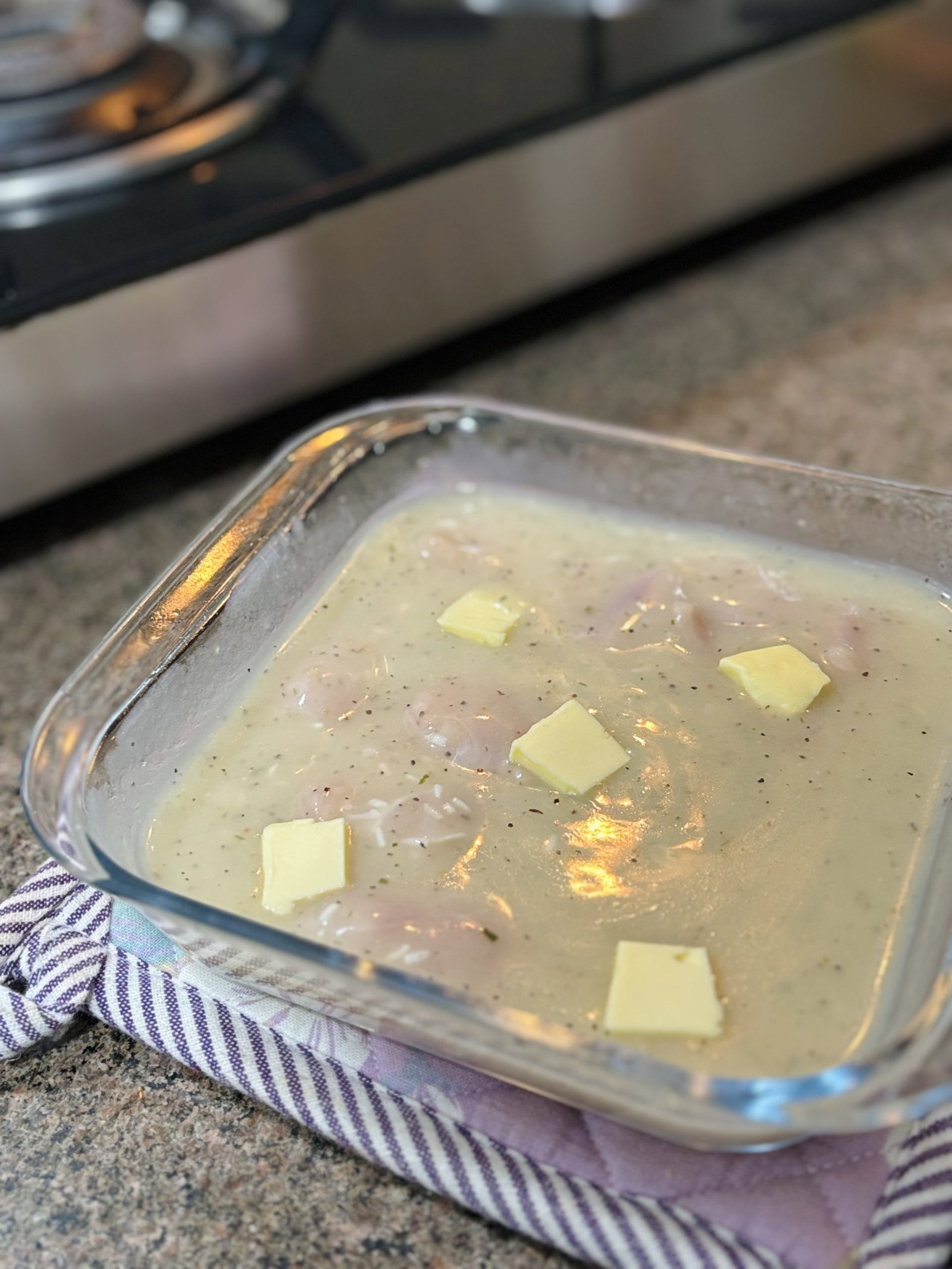 Dot the top of the mixture with butter