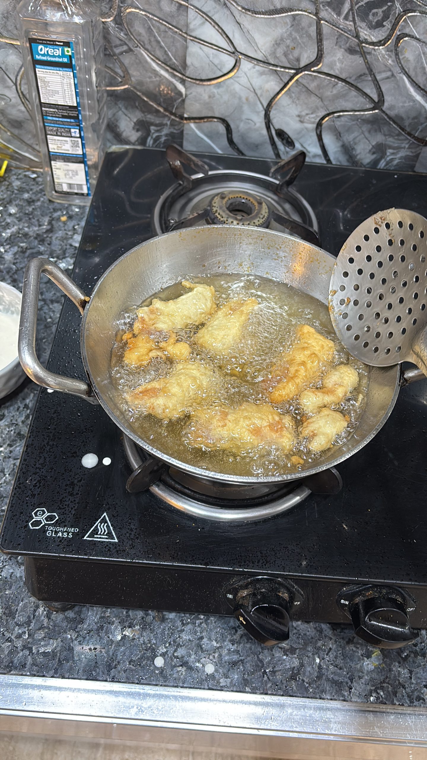 Fry until the exterior turns a rich golden brown and the protein is cooked through.