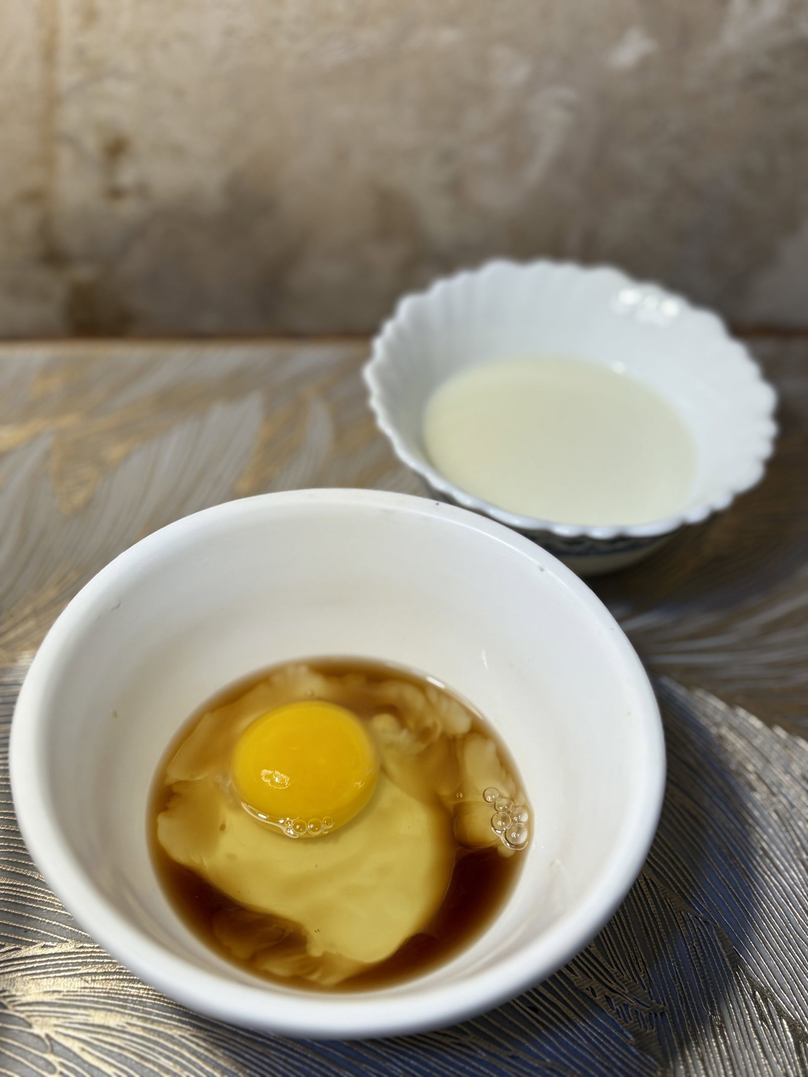 In another bowl, whisk the egg, milk, and vanilla until smooth.
