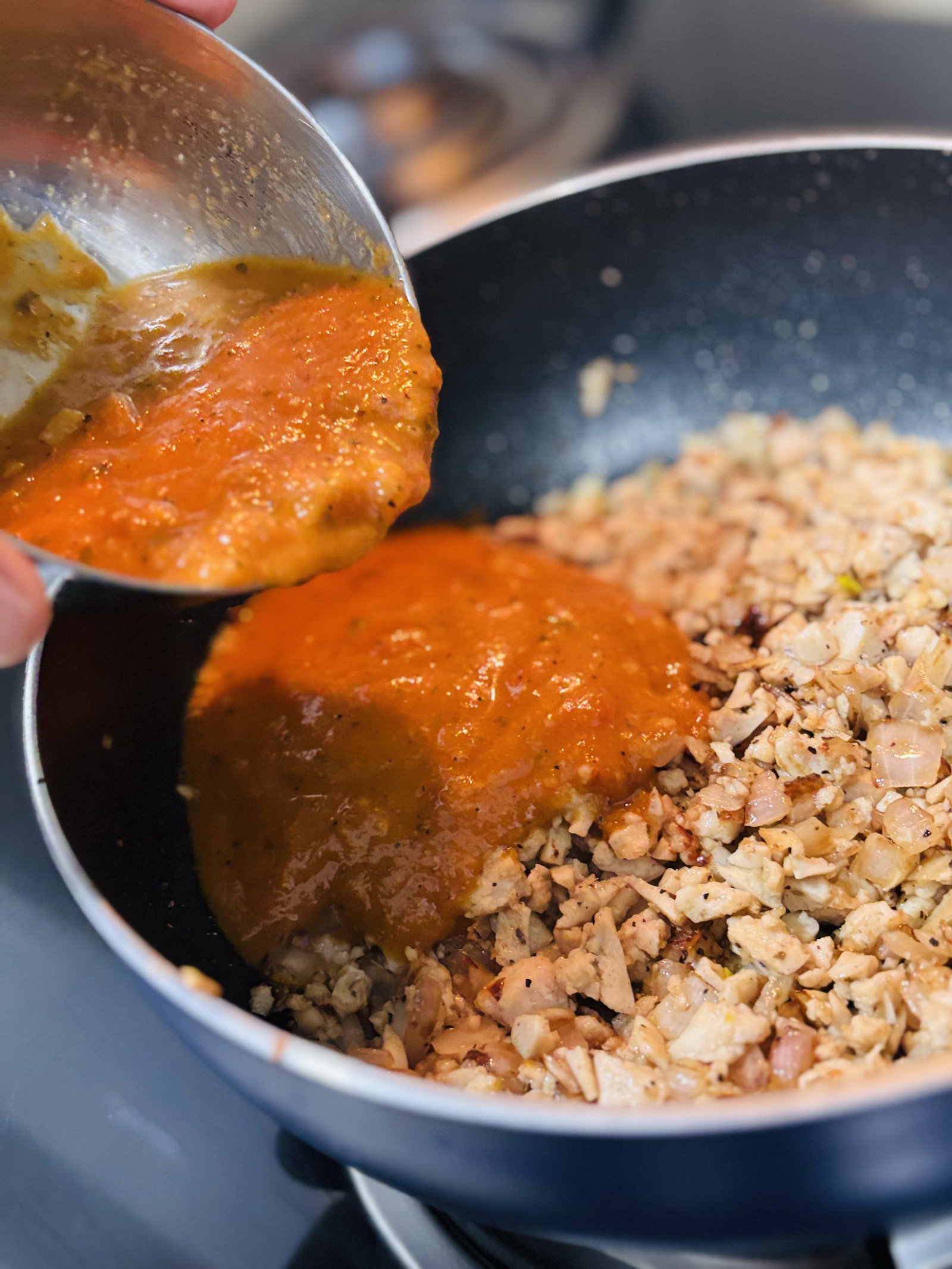 Pour the vegetable stock and marinara sauce, and bring the mixture to a boil.