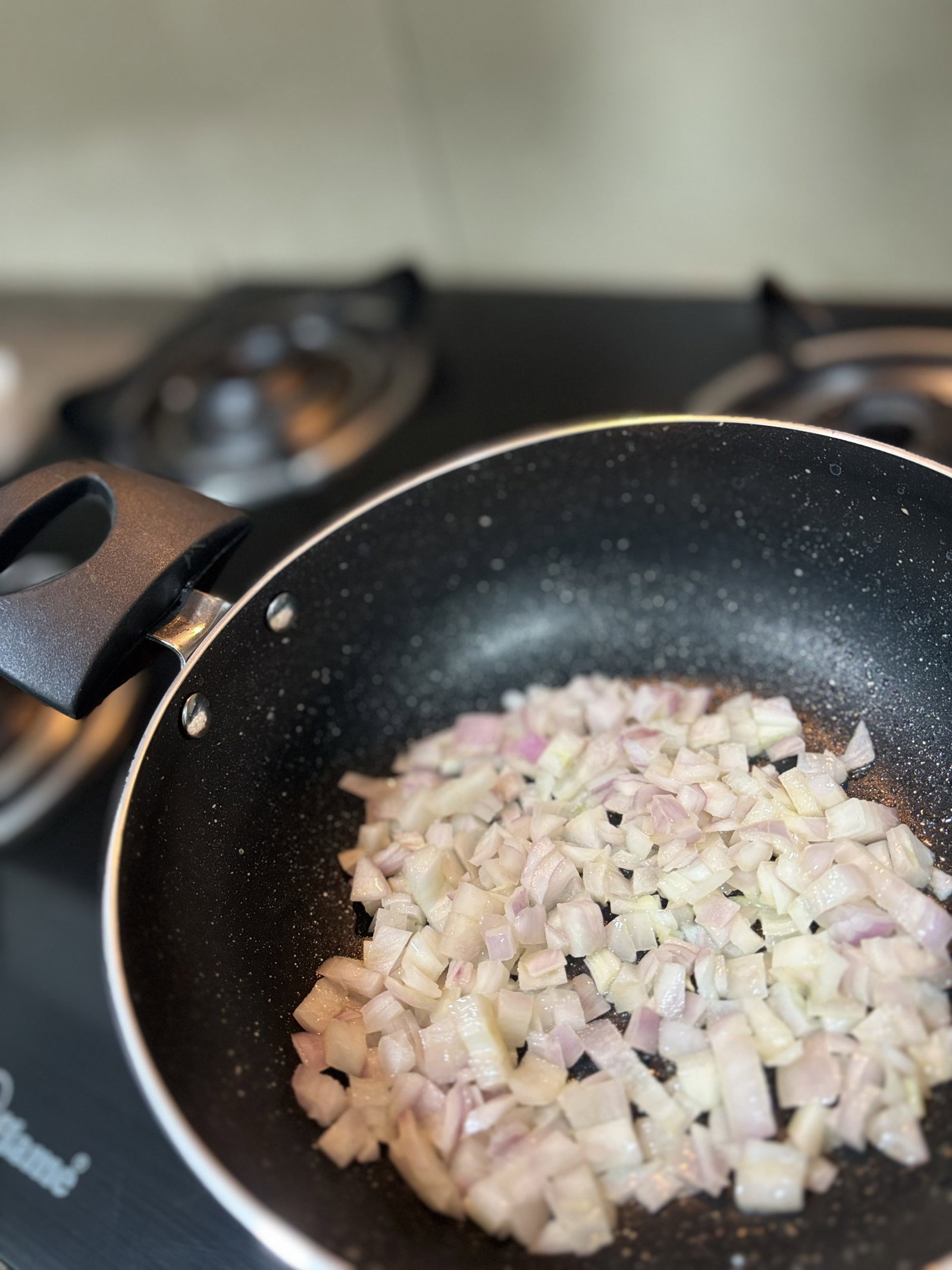 Sauté onion, garlic, and a pinch of salt and pepper until the onion turns translucent