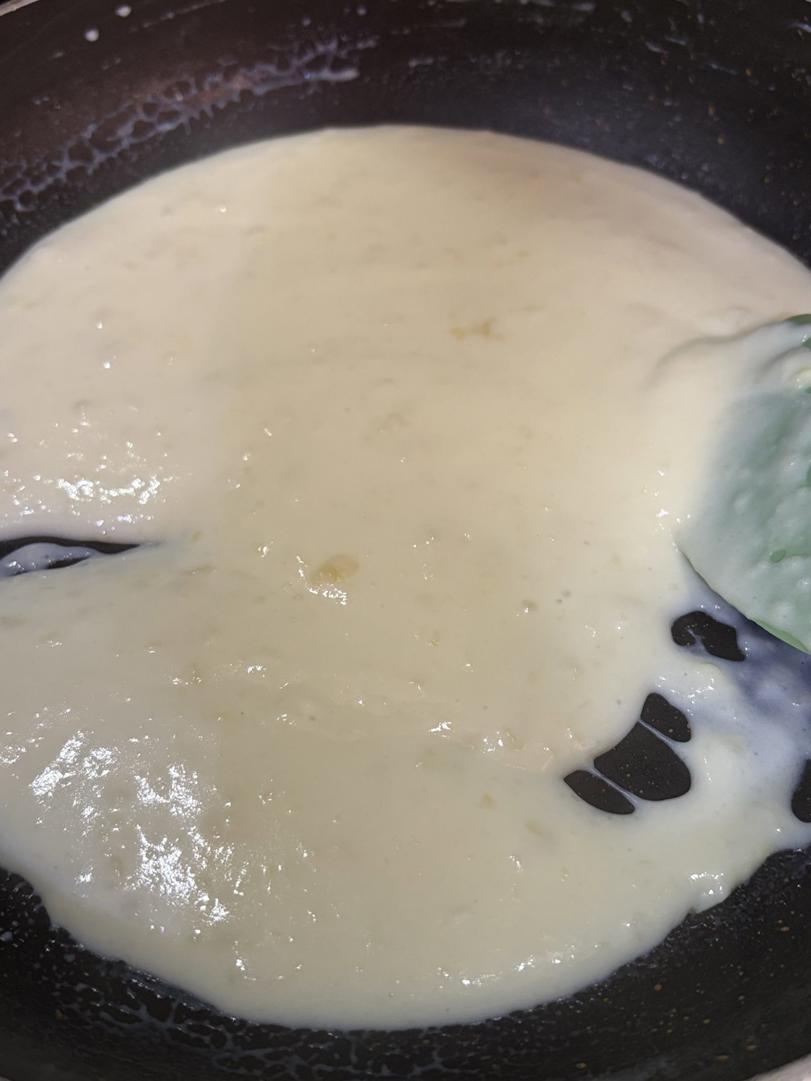 Slowly add milk, about ¼ cup at a time, whisking constantly to prevent lumps.