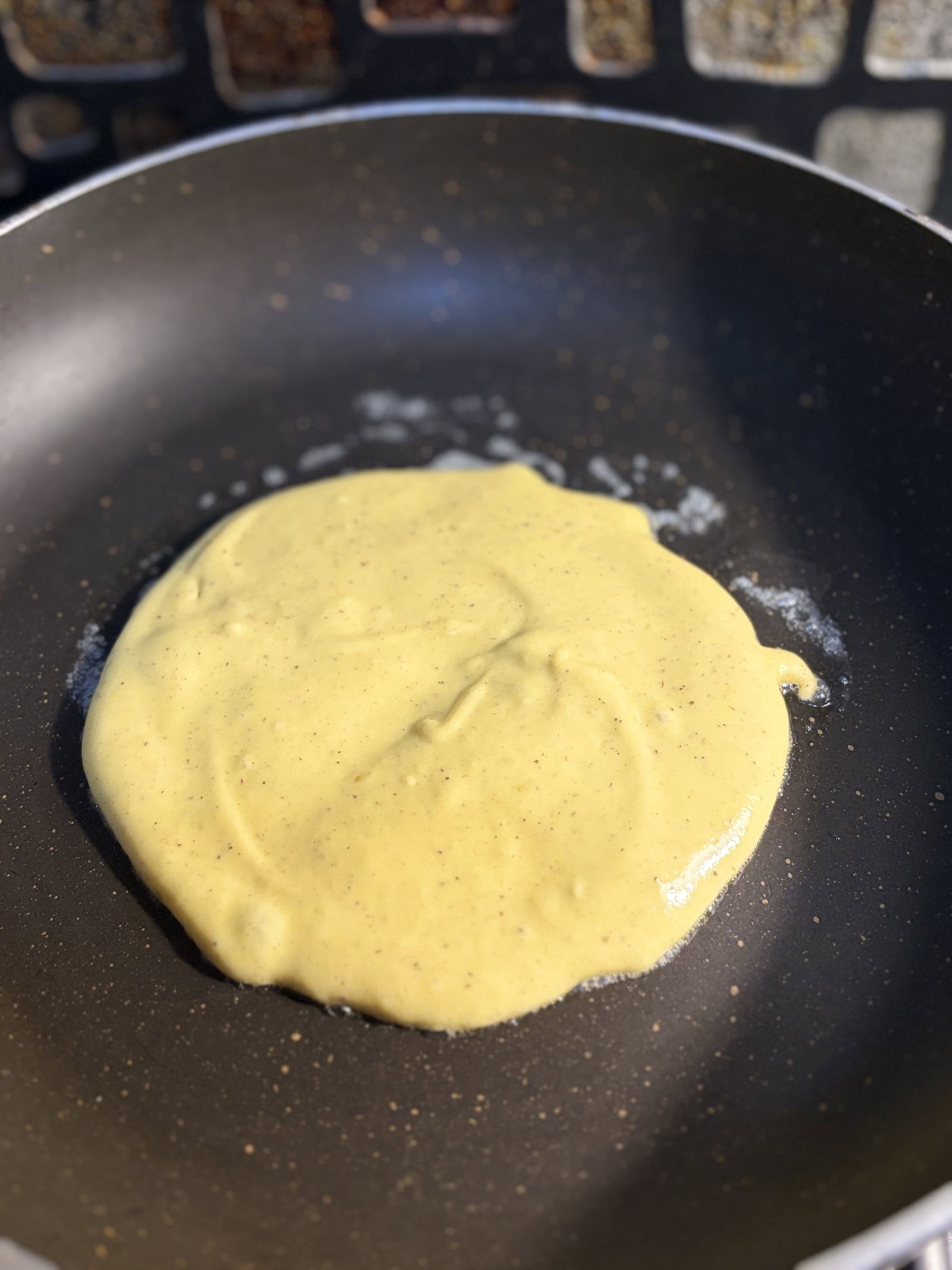 Warm a nonstick pan over medium heat until it’s ready for a test drop of batter