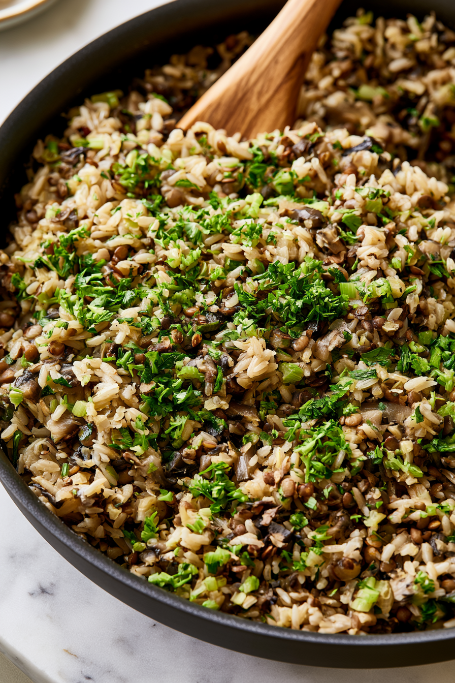 Add the cooked lentils, cooked rice, and parsley. Stir until everything is evenly combined