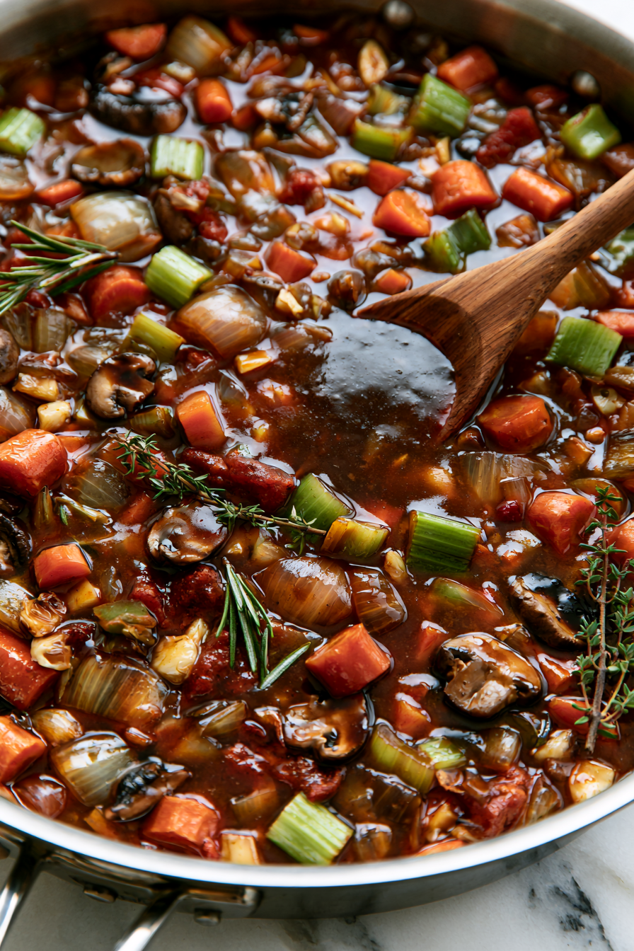 Sprinkle the flour over the vegetables and stir well to coat everything evenly