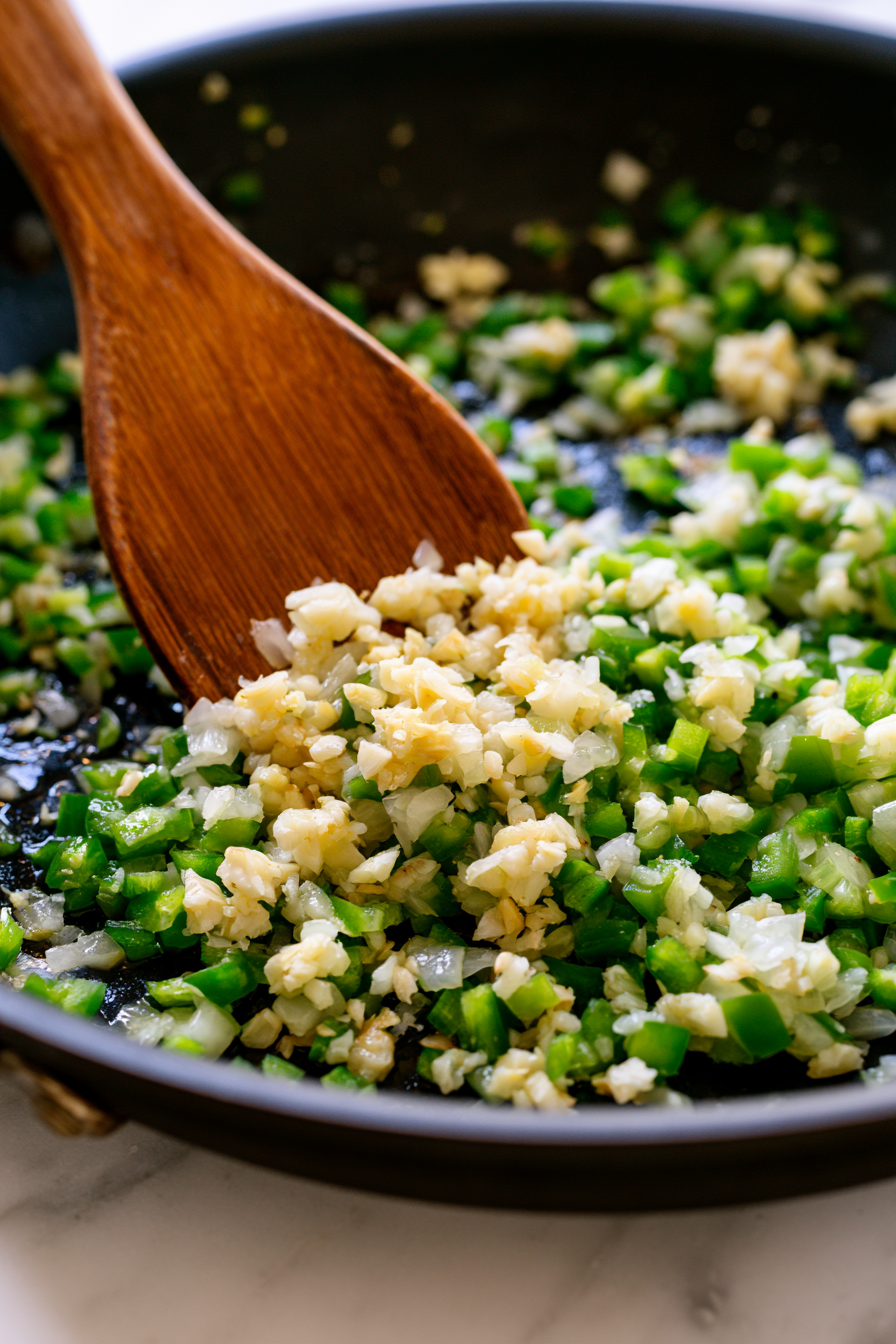 Stir in the garlic and cook for about 30 seconds until fragrant.