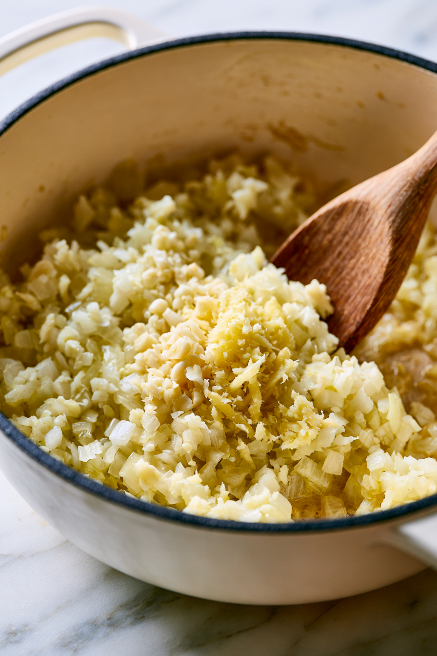 Stir in the onion and cook for 6 to 8 minutes until soft and lightly golden
