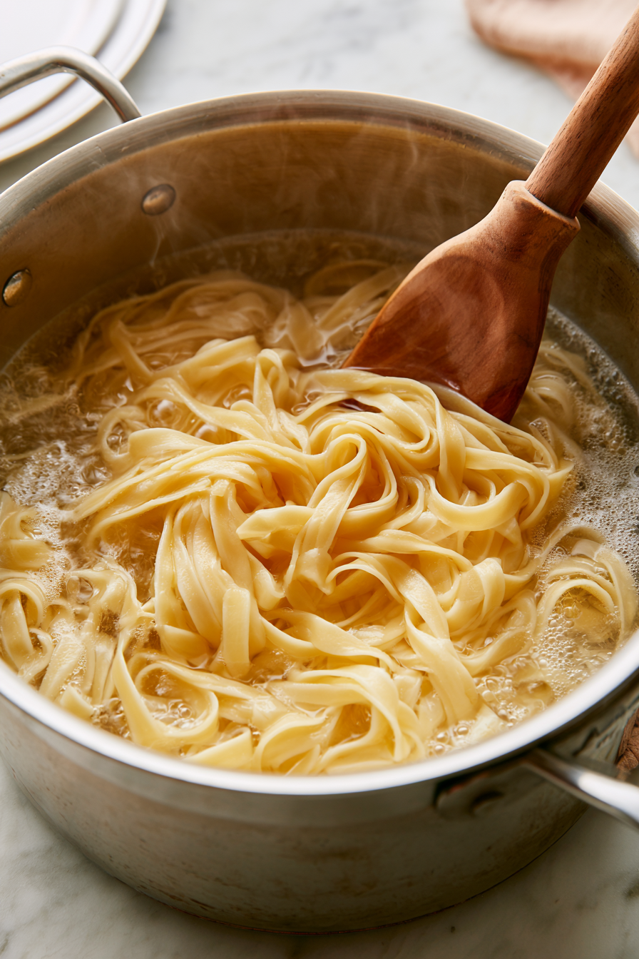 Bring a large pot of generously salted water to a boil. Cook the pasta according to the package directions until al dente. Before draining, reserve about ½ cup of the pasta water