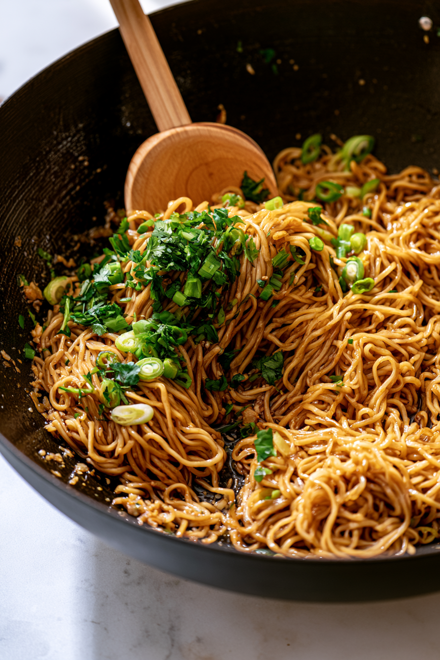 Remove from heat and stir in the green onion tops and cilantro, if using