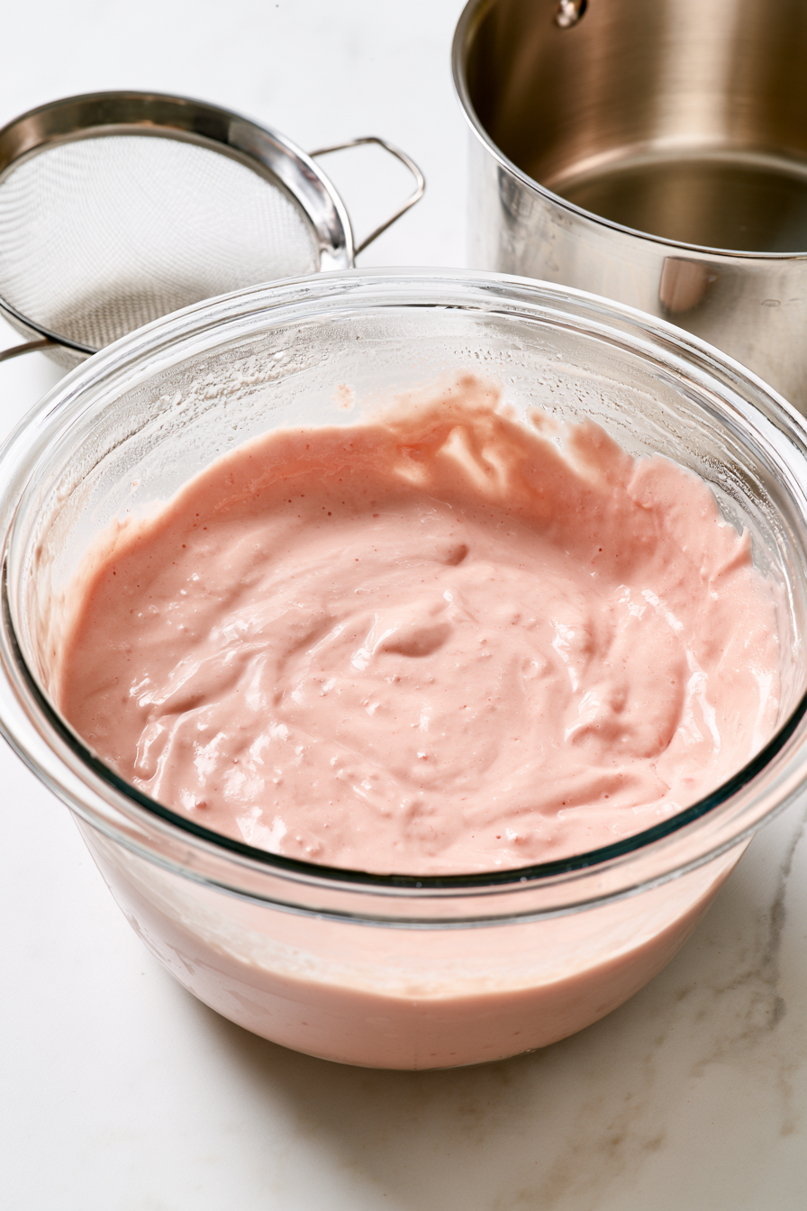 Remove from the heat and stir in the vanilla. Strain the custard into a clean bowl, cover, and refrigerate until completely chilled, at least 3 hours