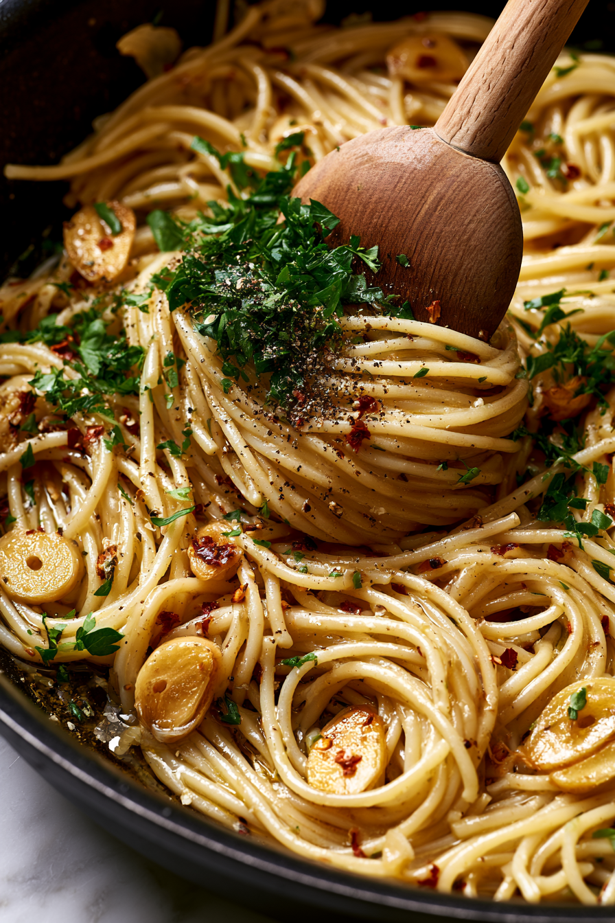 Remove the skillet from heat and stir in fresh parsley, black pepper, and vegan Parmesan or nutritional yeast if using