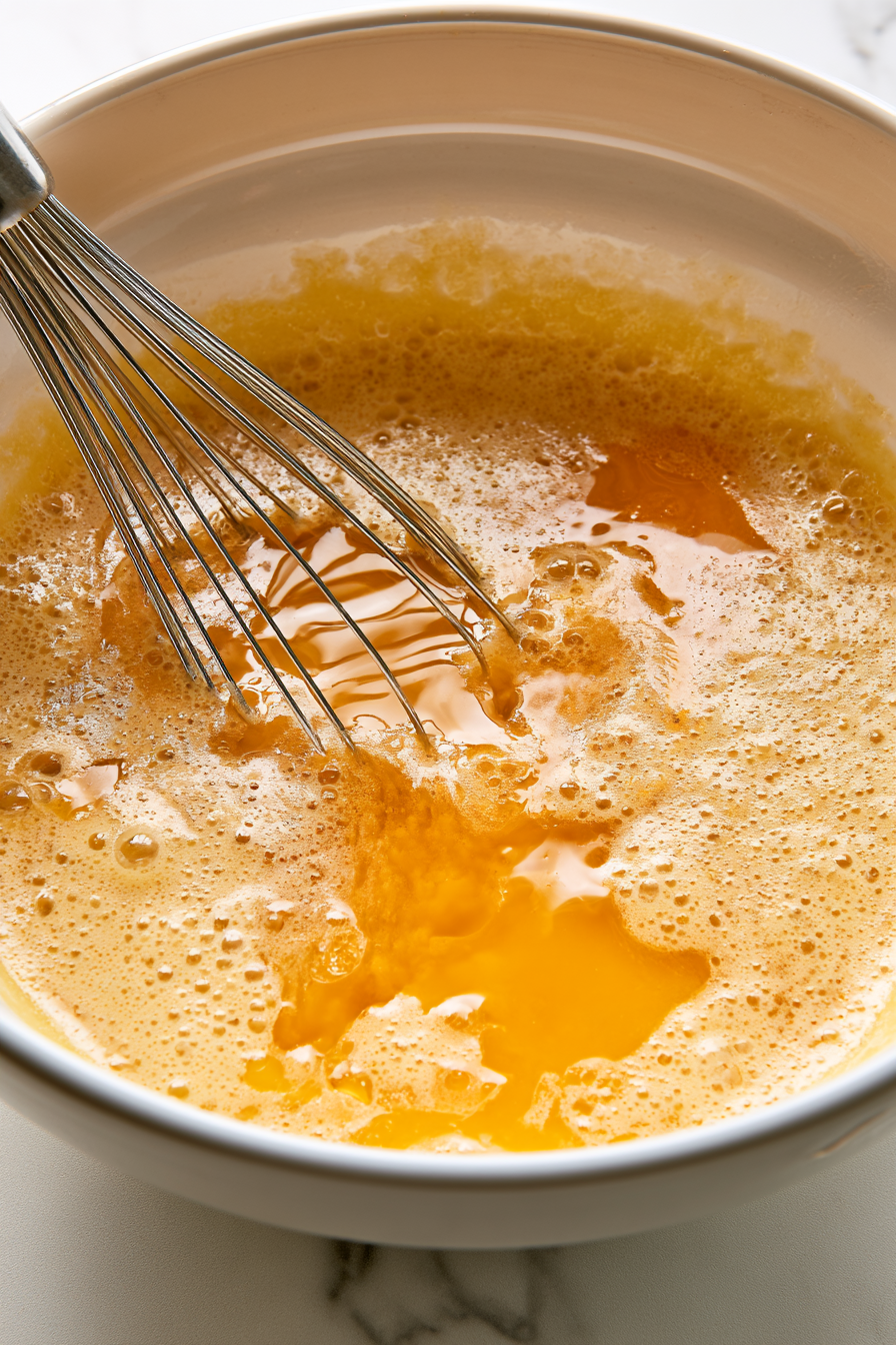 Whisk the eggs and brown sugar until smooth and slightly frothy