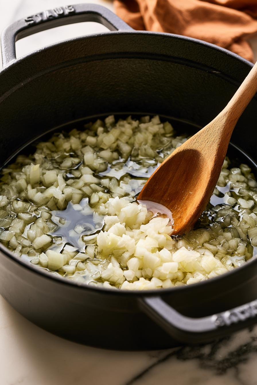 While the vegetables roast, heat 1 tablespoon olive oil in a large pot over medium heat